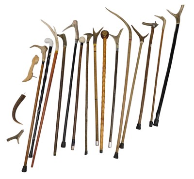 Lot 736 - A group of walking sticks, to include horn and...