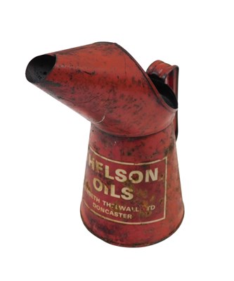 Lot 775 - A Thelson Oil red painted fuel can, 26cm high.