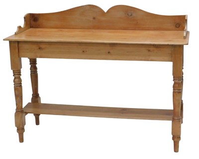 Lot 897 - A stripped pine wash stand, with a raised back,...