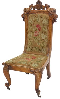 Lot 863 - A Victorian walnut nursing chair, the show...