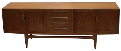 Lot 865 - A G plan teak low sideboard, with an...