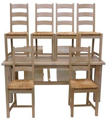 Lot 1171 - A limed oak rectangular extending dining table,...