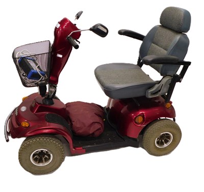 Lot 650 - A Kensington electric mobility scooter, in red,...