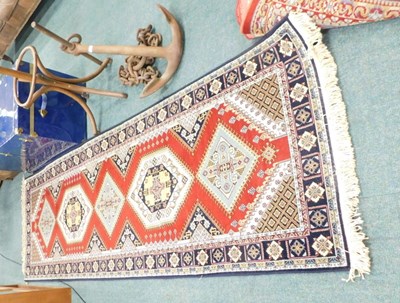 Lot 1684 - A modern machine woven wool runner, geometric...