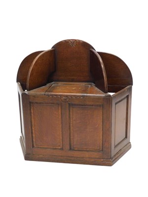 Lot 905 - A 1920s oak hall seat or bench, with shaped...