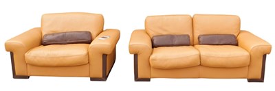 Lot 906 - An Italian tan and brown leather two seat sofa,...