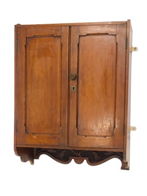 Lot 831 - A 19thC walnut wall cupboard, with two...
