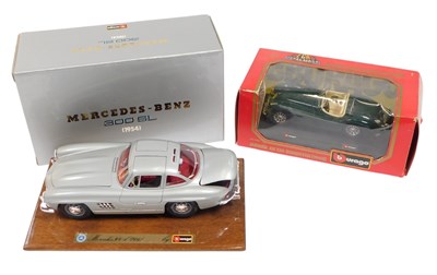 Lot 322 - A Burago Jaguar XK120 Roadster (1948), and a...