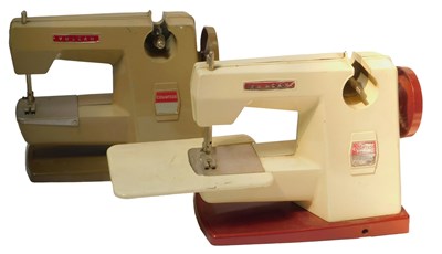 Lot 470 - A Vulcan Countess sewing machine, in red and...
