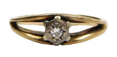 Lot 107 - A 9ct gold and diamond solitaire ring, in a...