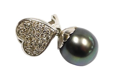 Lot 115 - A black lustre cultured pearl and diamond clip...