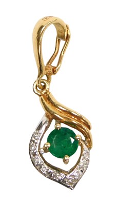 Lot 123 - An emerald and diamond pendant, in a scrolling...