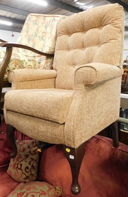 Lot 1610a - A fireside chair.