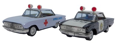Lot 574 - A tinplate friction police car and a tinplate...