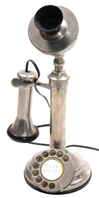 Lot 77 - An Ericsson The British candlestick...
