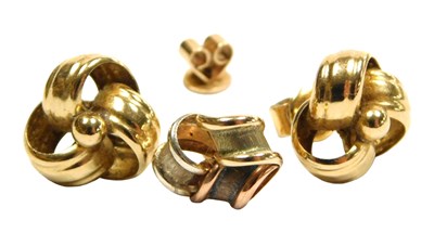 Lot 122 - A pair of knot earrings, yellow metal,...