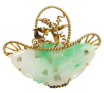 Lot 124 - A Chinese jade brooch, of carved floral form,...