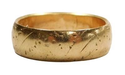 Lot 106 - A 9ct gold wedding band, with engraved...