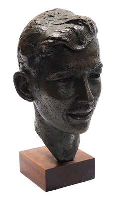 Lot 149 - A 20thC bronzed plaster bust of a man, raised...