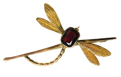 Lot 301 - A garnet set dragonfly brooch, yellow metal...