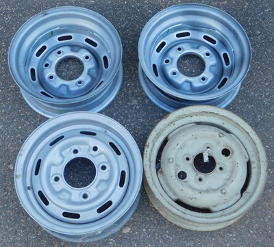 Lot 20 - A set of four steel wheels.