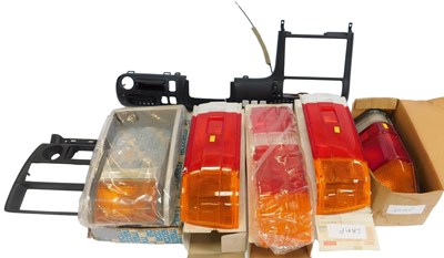 Lot 98 - Mazda lamps, radiator, and other spares.
