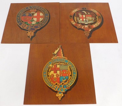 Lot 133 - Three plywood panels, with crests for...