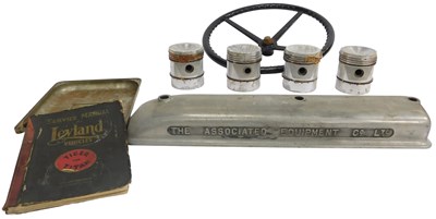 Lot 94A - Four pistons and cast aluminium head marked...