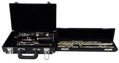 Lot 171 - A clarinet, cased, together with a flute,...