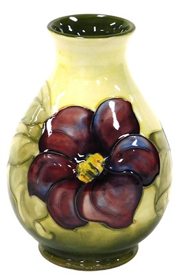 Lot 175 - A Moorcroft pottery Anemone pattern vase, with...
