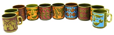 Lot 237 - Nine Hornsea Pottery mugs, 7 handled, 2...