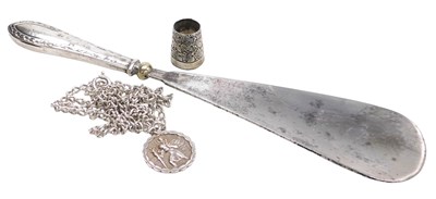 Lot 211 - A George V silver handled shoe horn,...