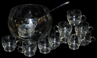 Lot 288 - A cut glass punch set, engraved with vines,...
