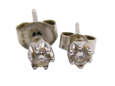 Lot 319 - A pair of diamond single stone ear studs, high...