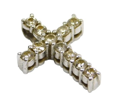 Lot 320 - A platinum and diamond pendant cross, set with...