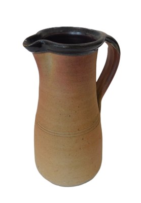 Lot 233 - Muchelney. A studio pottery brown matt glazed...