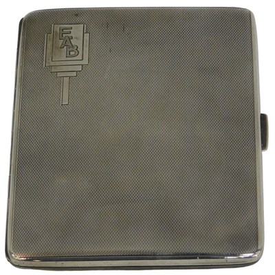 Lot 21 - A George VI silver cigarette case, with engine...