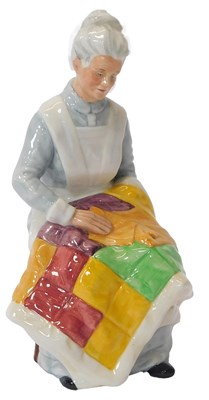 Lot 132 - A Royal Doulton porcelain figure, modelled as...