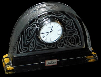 Lot 346 - A Baccarat glass Art Deco pattern mantel clock,...