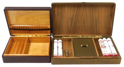Lot 299 - A leather-bound cigar box, containing five P....