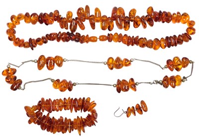 Lot 322 - An amber necklace, further white metal and...