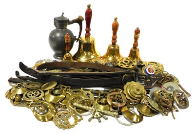 Lot 359 - Four graduated brass hand bells, with turned...