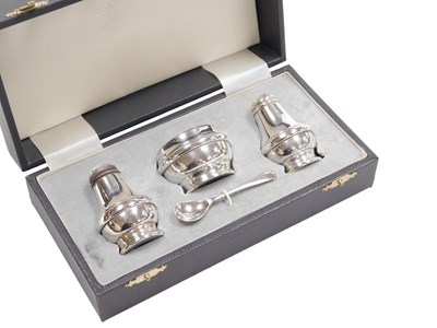 Lot 366 - An Elizabeth II silver three piece condiment...