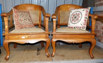 Lot 1008 - A pair of reproduction hardwood tub chairs,...