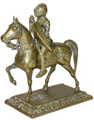 Lot 372 - A brass model of a knight on horseback, raised...