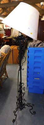 Lot 1124 - A wrought metal standard lamp base, with...