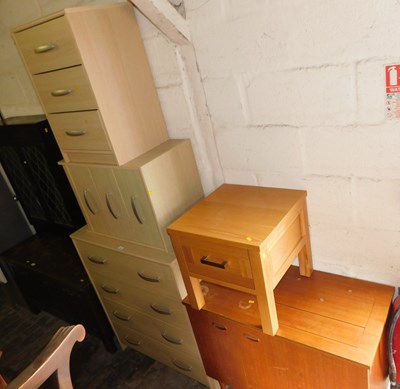 Lot 1057 - A teak sewing machine table, together with a...