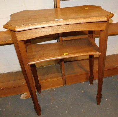 Lot 1130 - An oak two tier side table, on square legs...