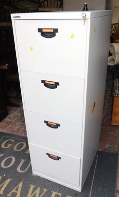 Lot 1064 - A Triumph four drawer filing cabinet, with...