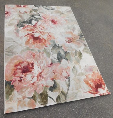 Lot 1134 - A contemporary machine woven rug, grey ground,...